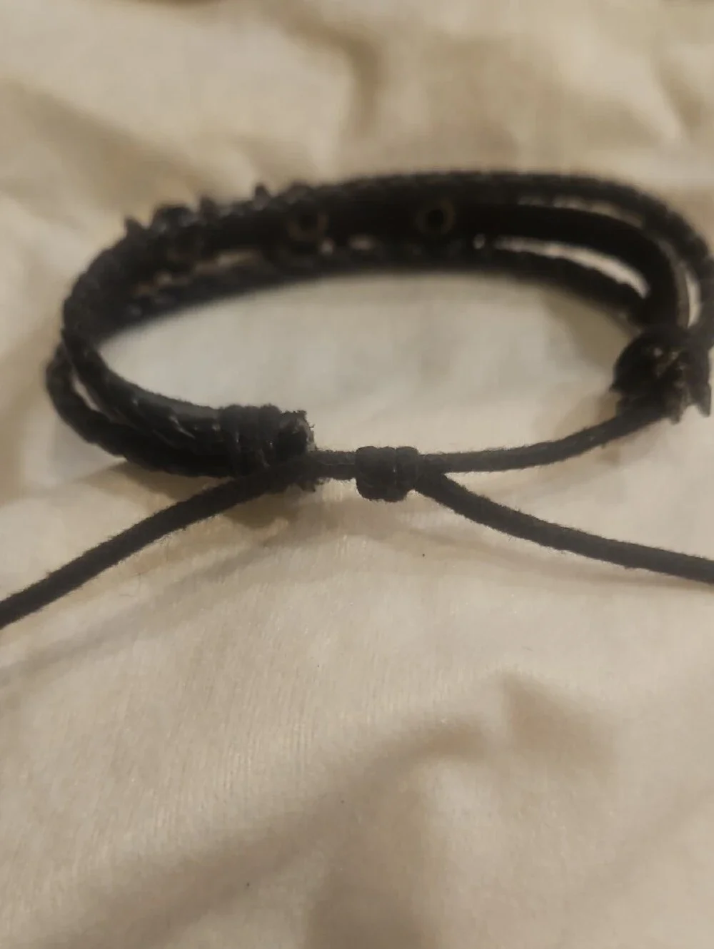 Black Braided Leather Bracelet with Silver Skull Accents